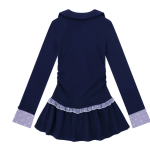 A short dress with a cinched waist in the school style