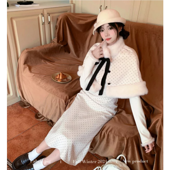 Apricot-colored polka dot cape suit