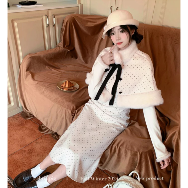 Apricot-colored polka dot cape suit