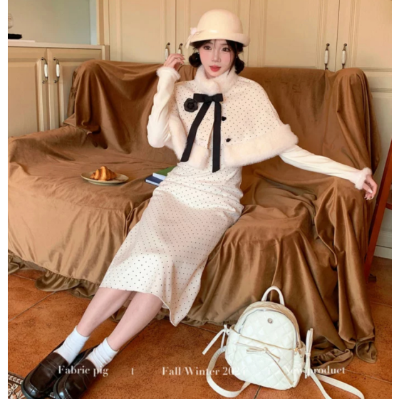 Apricot-colored polka dot cape suit