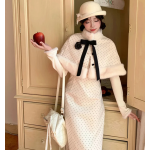 Apricot-colored polka dot cape suit