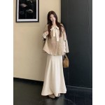 An elegant and stylish two-piece cape set