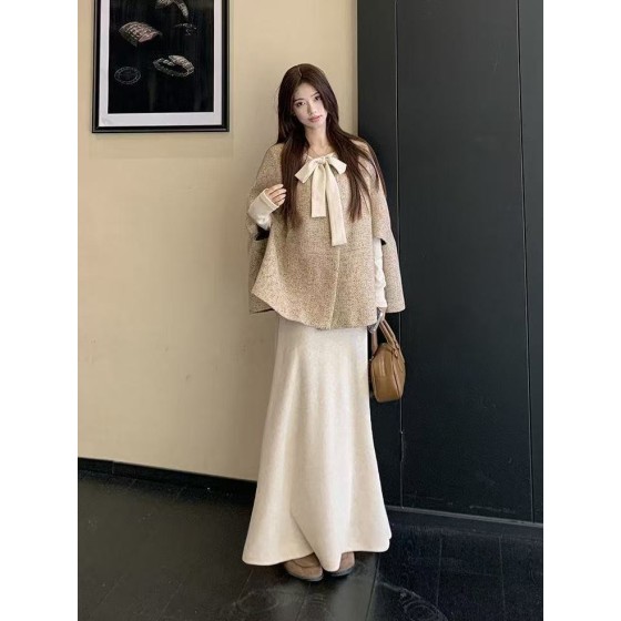 An elegant and stylish two-piece cape set