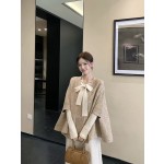 An elegant and stylish two-piece cape set